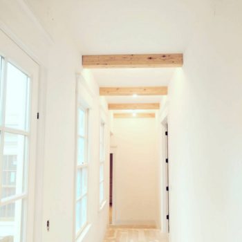 Custom build hallway with wood beams